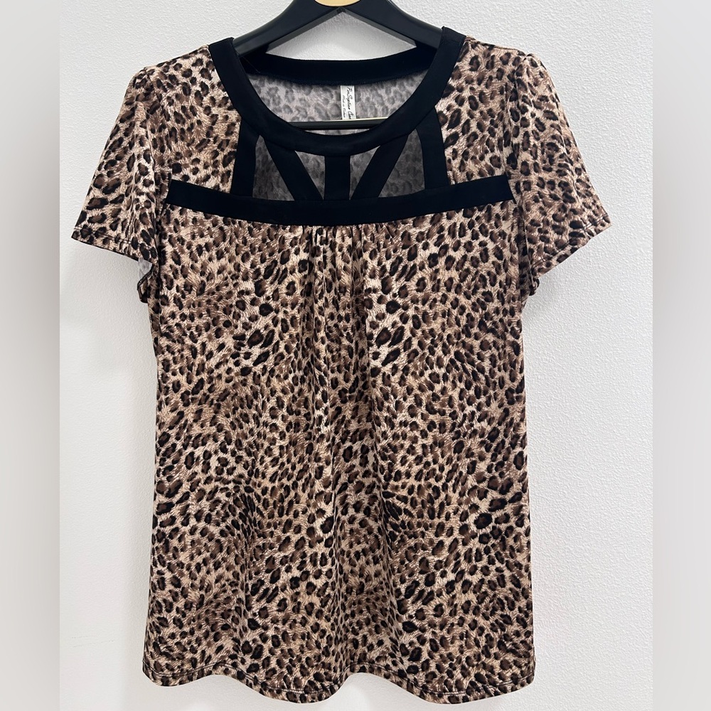 PerSeption Concept Animal Print Blouse with Black Trim Chic animal print blouse.